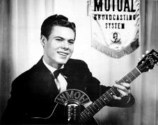 Billy Johnson with guitar, WMOH Hamilton, Ohio, 1947  (Photo provided by Billy Johnson. All rights reserved.)